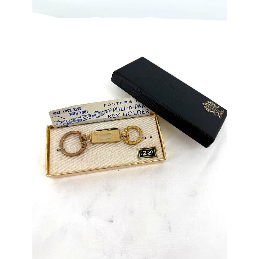 Vintage Foster’s Pull A Part Key Holder Gold Tone Keychain In Original Box